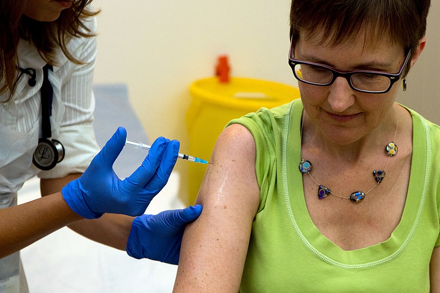 Women getting a vaccine