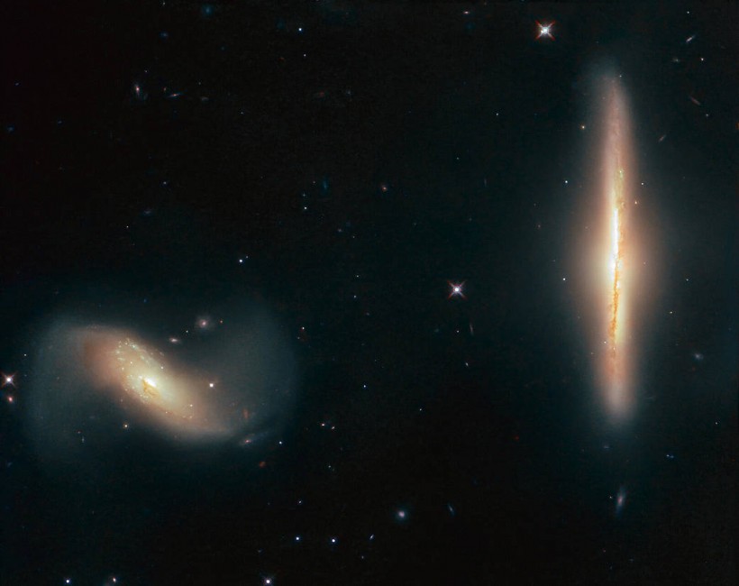 Hubble Spots 'Dynamic Duo' in Deep Space and a Galaxy Brimming with Young Suns