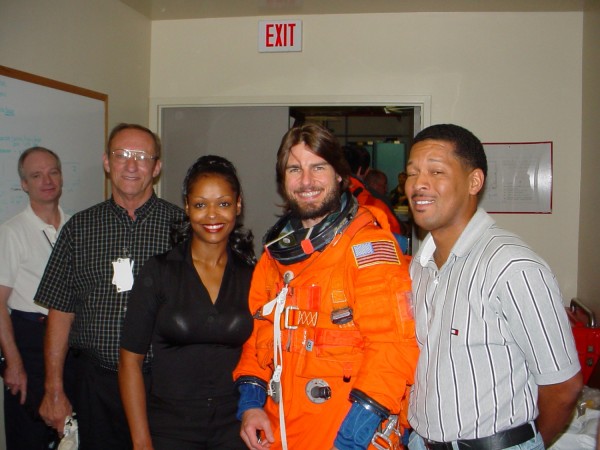 Tom Cruise visited NASA to ride in the Bldg 5 Motion Base. Pictured l to r: Charlie Precourt, Bill Todd, McDougle, Tom Cruise, George Brittingham.