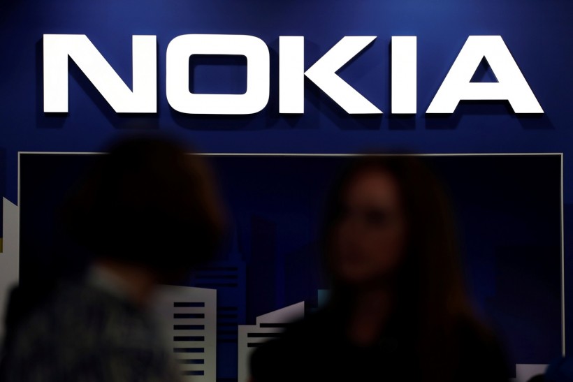 Visitors gather outside the Nokia booth at the Mobile World Congress in Barcelona