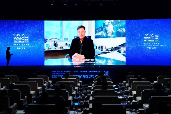 Tesla Inc CEO Elon Musk is seen on a screen during the opening ceremony of the WAIC in Shanghai