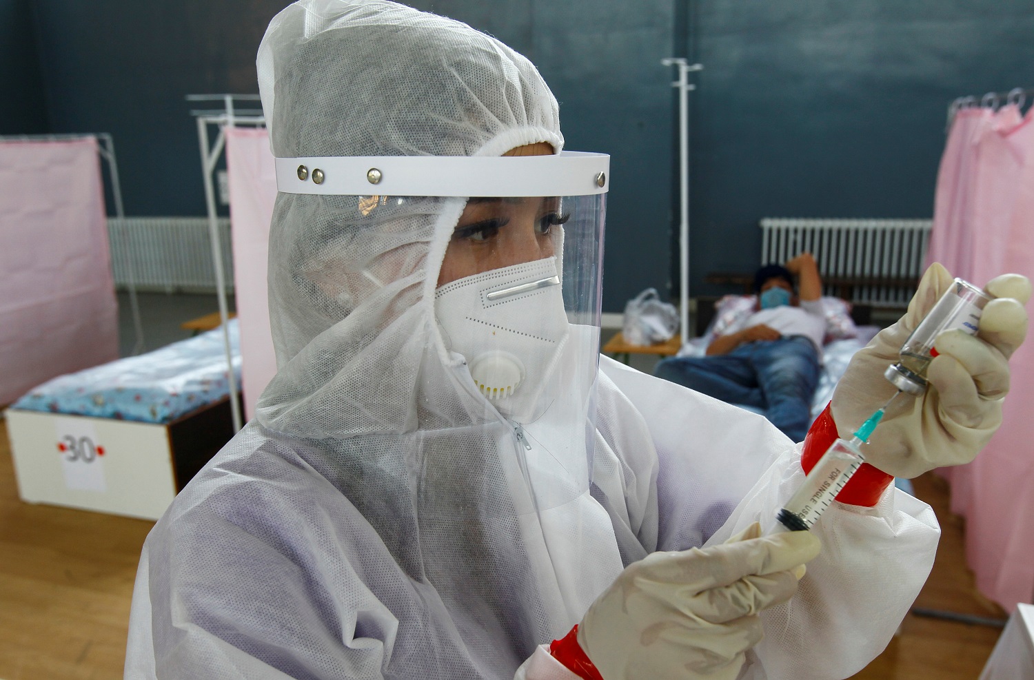 Medical specialists treat patients at a day hospital amid the coronavirus disease (COVID-19) outbreak in Bishkek