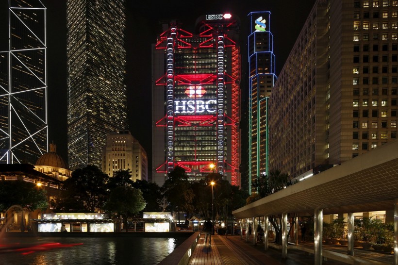The HSBC headquarters is lit up at the Central Financial District in Hong Kong