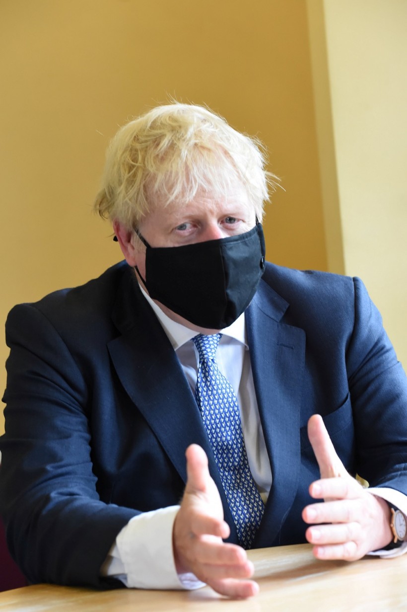 Britain's Prime Minister Boris Johnson visits the Tollgate Medical Centre in Beckton, London