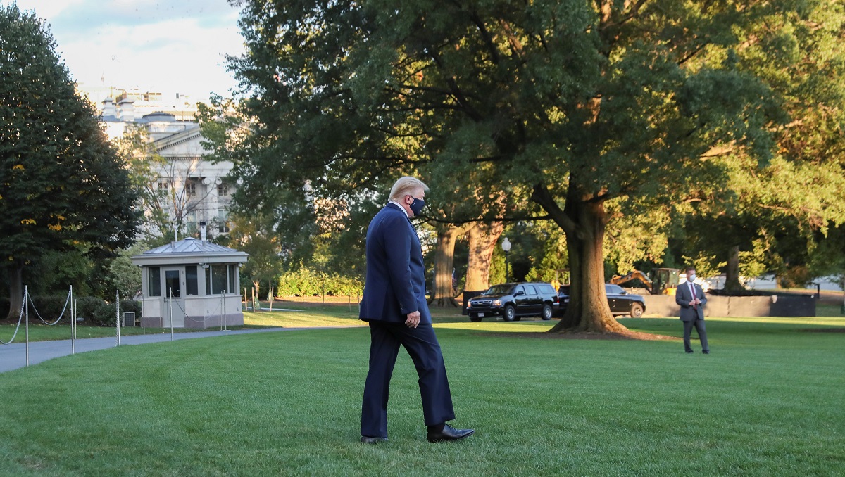 U.S. President Trump walks to the Marine One helicopter as he departs for Walter Reed Medical Center from the White House in Washington