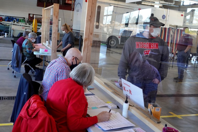 Across The U.S. Voters Flock To The Polls On Election Day
