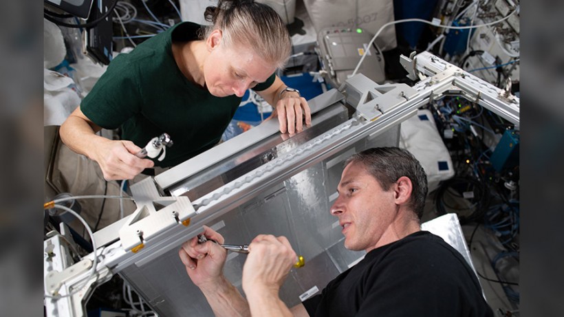 NASA Expedition 65 Crew Installing Temporary Sleeping Quarters