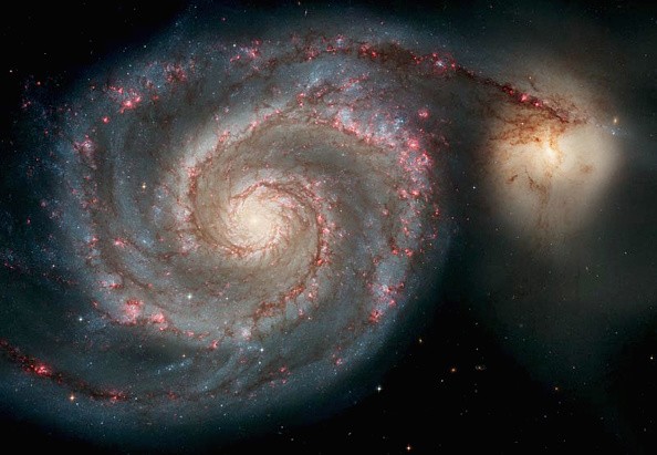 NASA Hubble Space Telescope Captures Spiral Galaxy In Very Unusual Location, Has Planets With Extremely Active Centers 