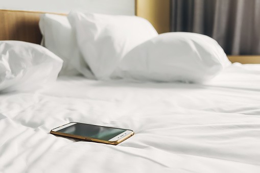 Gadgets in bed white 