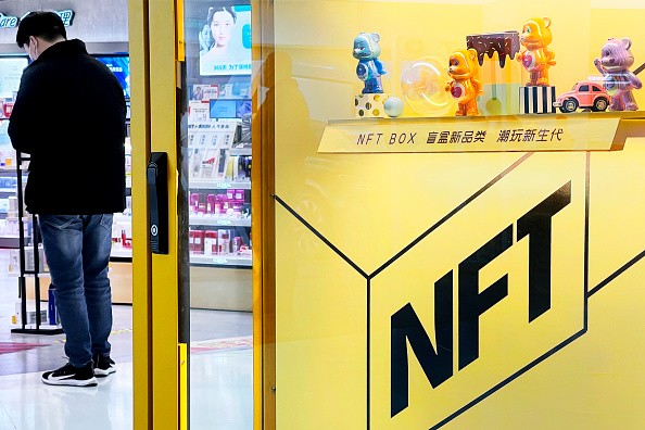 NFT metaverse products on display in a machine in Beijing, China