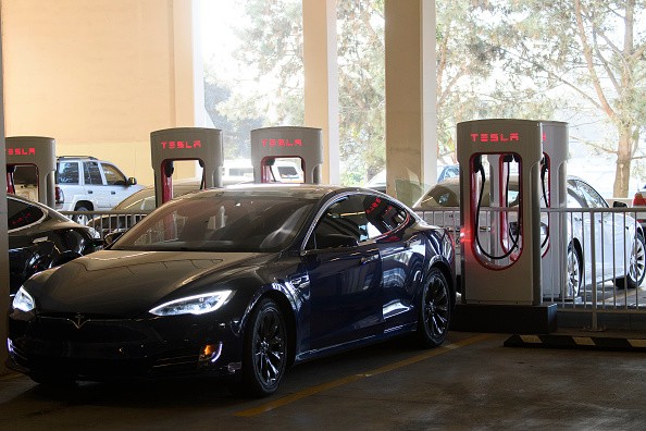 Tesla Supercharger Vs. Electrify America: Which One Offers Better EV Charging Experience?