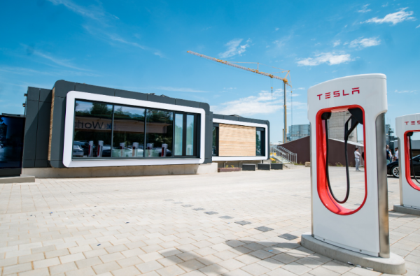 Tesla Supercharger Qubes Rolls Out in Europe—Offering Automated Coffee Machines and More!