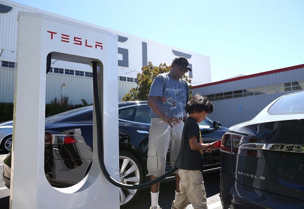 Tesla Magic Dock Supercharger Begins Testing in the US, Allowing Other EVs  to Charge