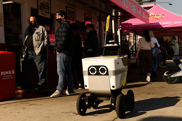 Uber Eats Delivery Robot Crashes Into a Police Crime Scene in LA 