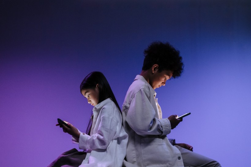 Teens using Mobile Phones