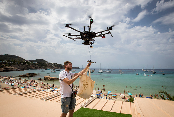 TOPSHOT-SPAIN-IBIZA-DRONE-FOOD-DELIVERY