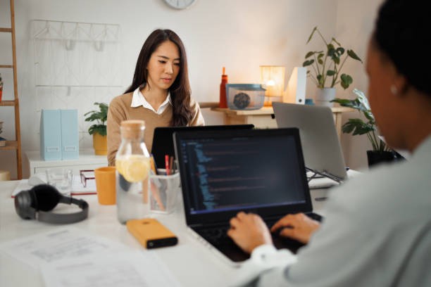 Businesswoman working from the home office stock photo
