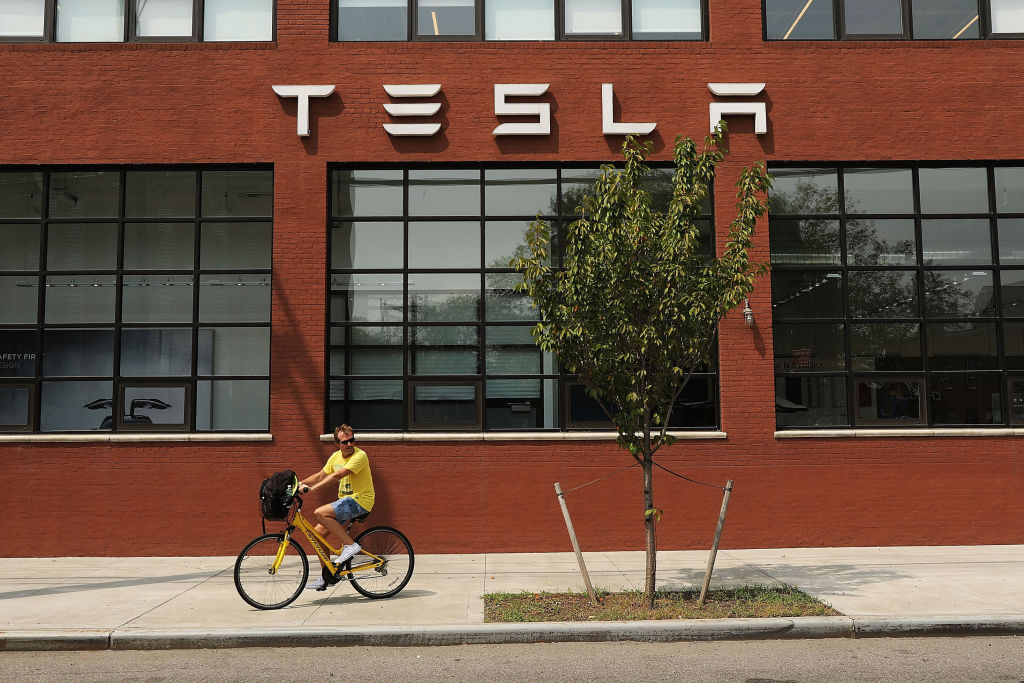 Tesla Shares Slide After Auto Maker Announces That It Will Remain Public