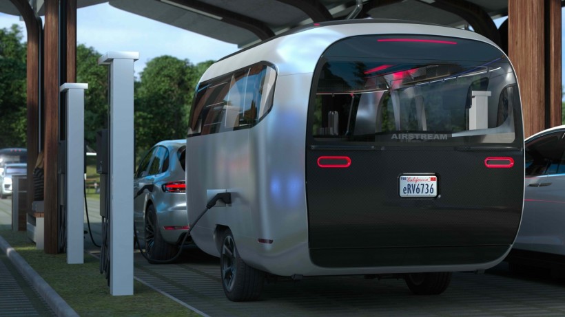 Thor Industries Unveils Innovative EV Charging Stations for RVs, Trailers, & Tow Trucks in Rural Landscape