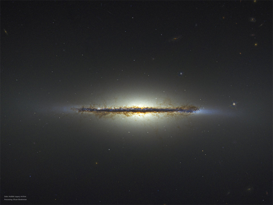 NASA's Picture of the Day Offers Stunning View of a Disc Galaxy Seen From Its Edge