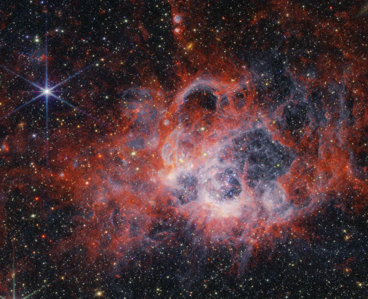 NASA's James Webb Space Telescope Takes a Look at the Mysterious Cosmic Tendrils of NGC 604