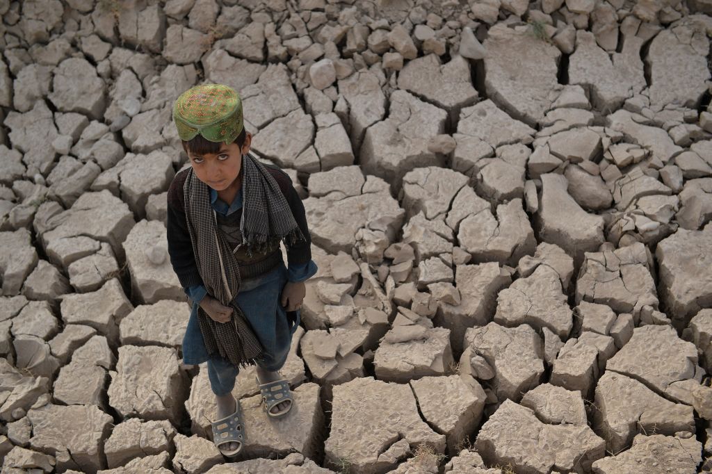 TOPSHOT-AFGHANISTAN-UN-CLIMATE-COP26-MIGRATION