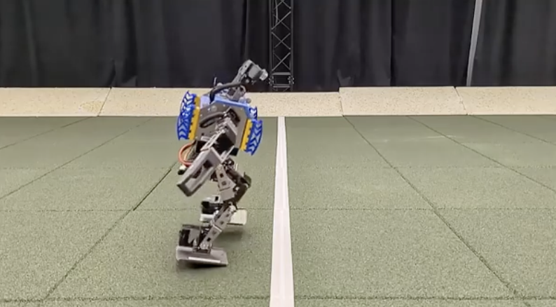 Screenshot from Learning agile soccer skills for a bipedal robot with deep reinforcement learning