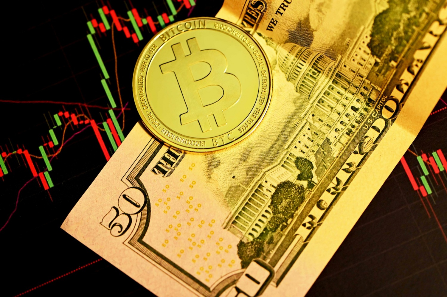 A single Bitcoin on top of $50 dollars cash