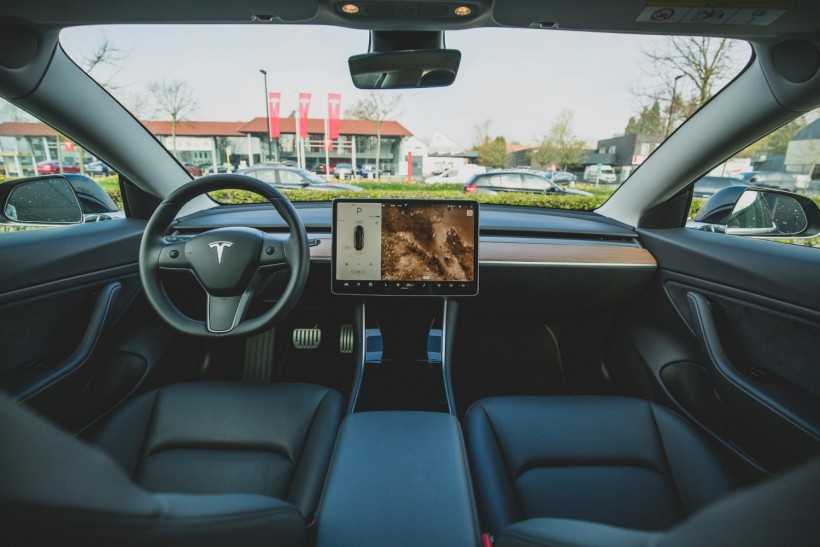 Tesla Applies For Automated Sanitization System For Robotaxi Cars in Latest Patent