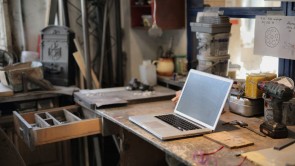 Laptop on table in workshop