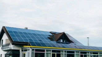 a house with solar panels on the roof