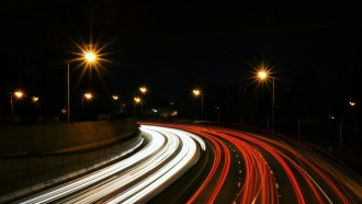 time-lapse photography of highway road at night